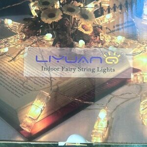 Indoor fairy string lights with photo clips